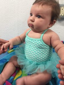 Sophie getting ready for baby swim class