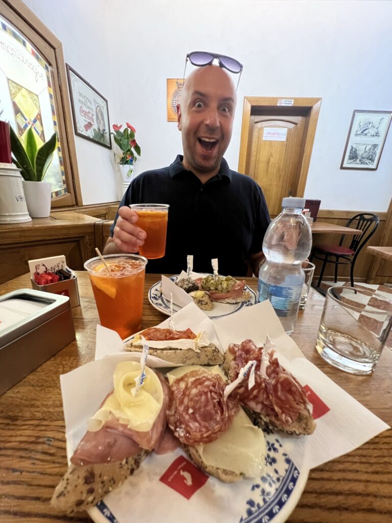 Enjoying cicchetti at a local trattoria