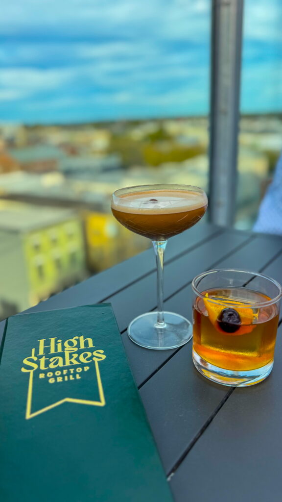 Grab dinner and cocktails at the High Stakes Rooftop Grill