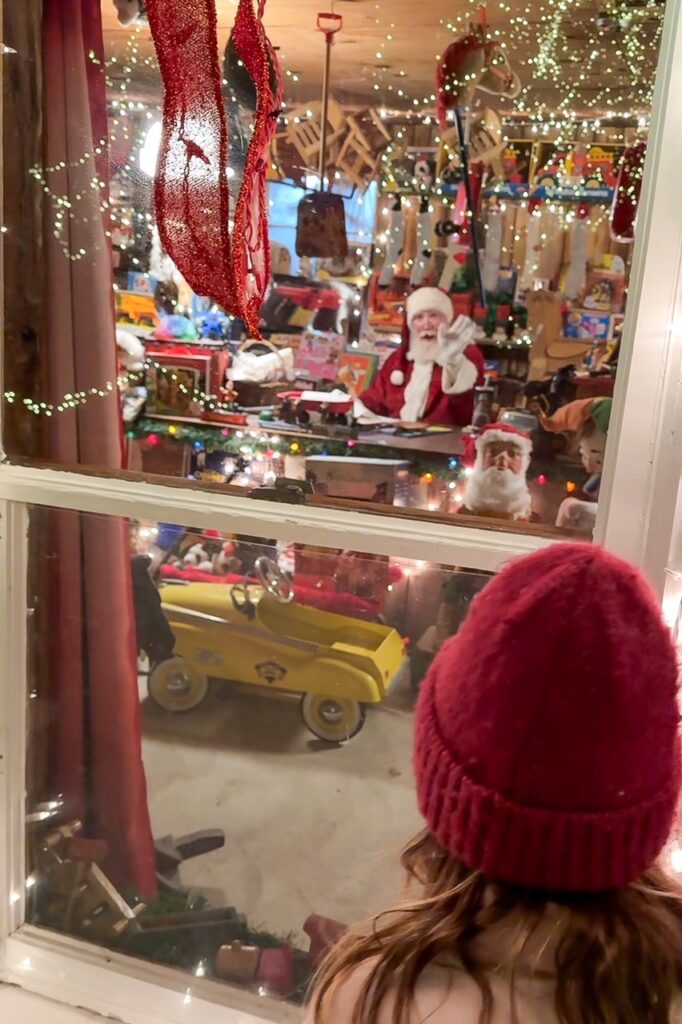 Santa waves from his workshop at Clifton Mill