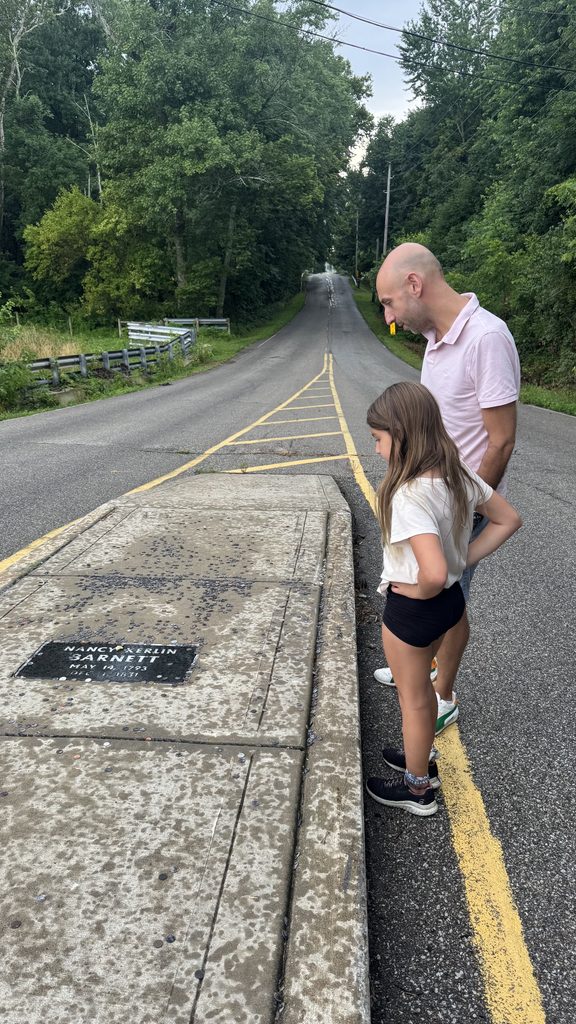 The grave is in the middle of a public road in Johnson County, Indiana 