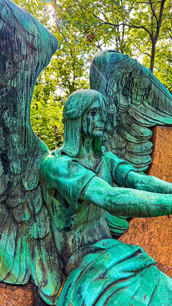 The angel appears to be crying black tears 